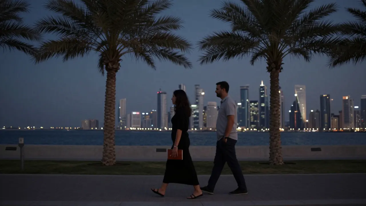 A man and woman walking peacefully along the Corniche at dusk, silhouetted against the twilight skyline, no physical contact.